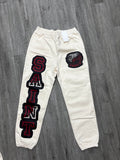 Saint vanity sweatpants cream/ red logo