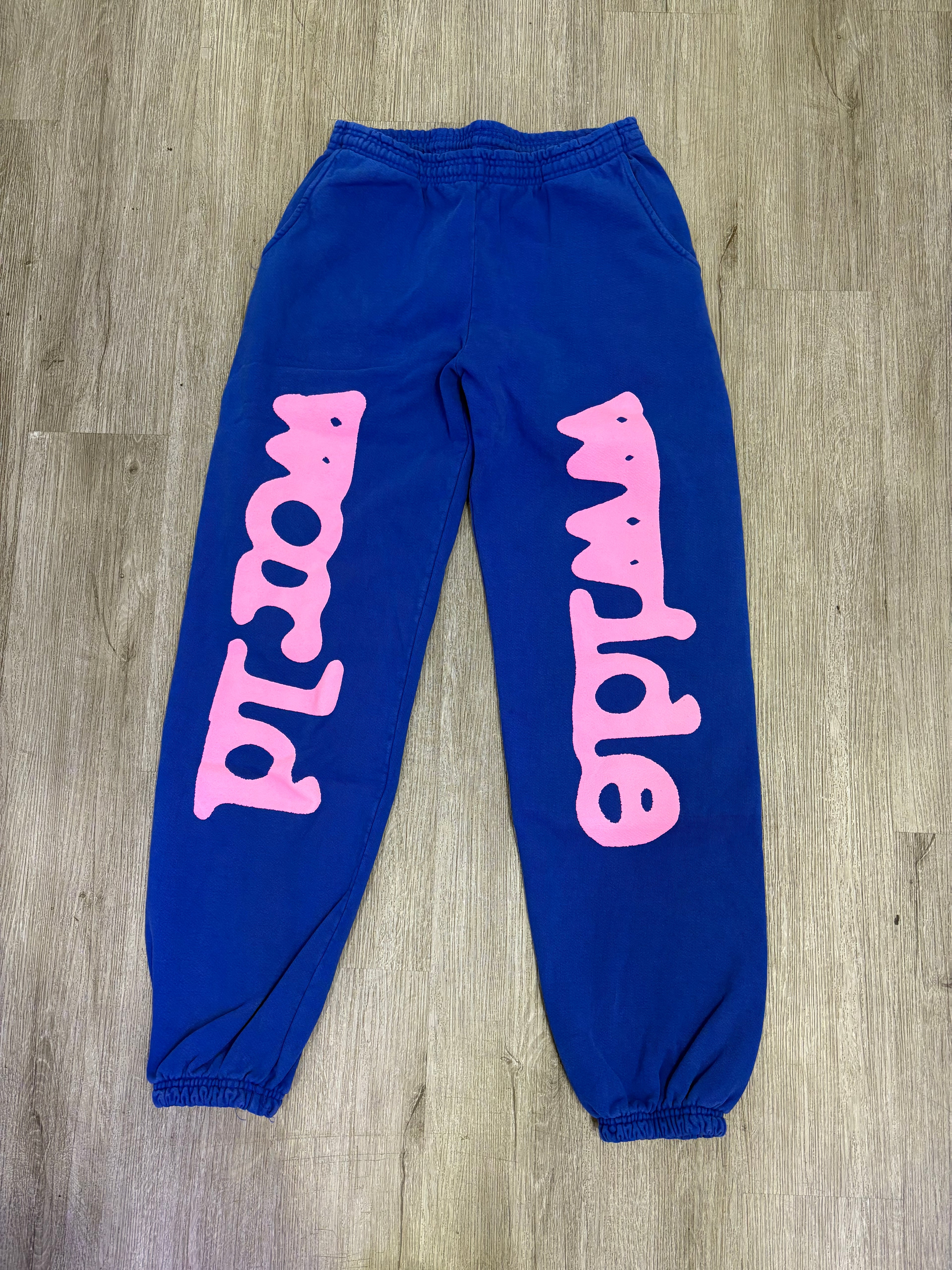 Spider sweatpants blue/ pink logo