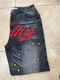 Vale lives jeans black red logo all over yellow stars