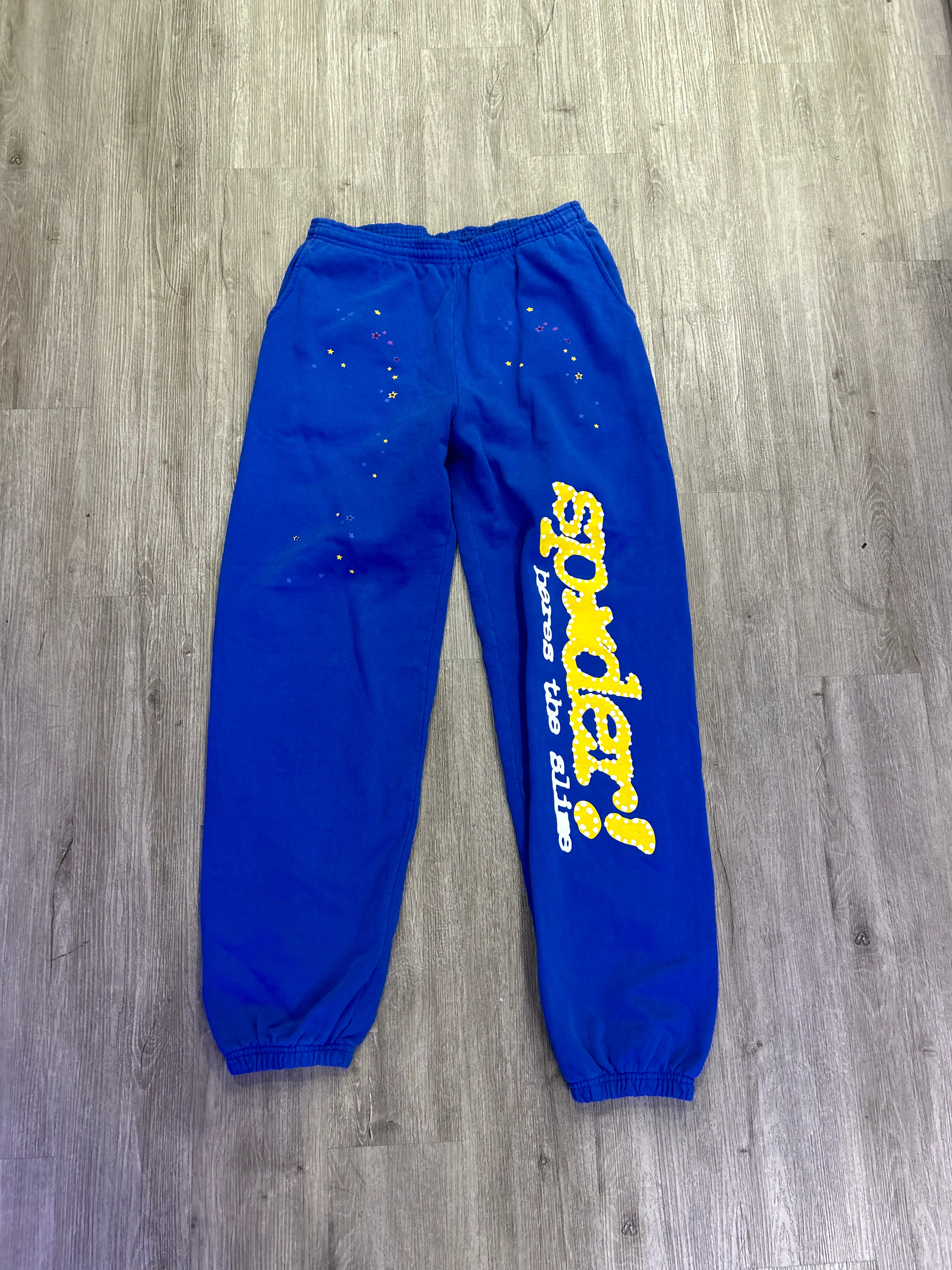 Spider sweatpants blue/ yellow logo